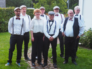 (v. l.) Luis Tanhanga, Dennis Jablonsky, Dorothea Stracke, Friedhelm Patzelt, Helmut Schmitz, Michael Grammel, Karl-Heinz Meng und Joachim Goyke
